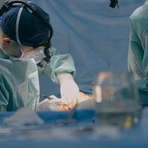 Group,Of,Surgeons,Men,Doctors,Physicians,In,Medical,Masks,Process